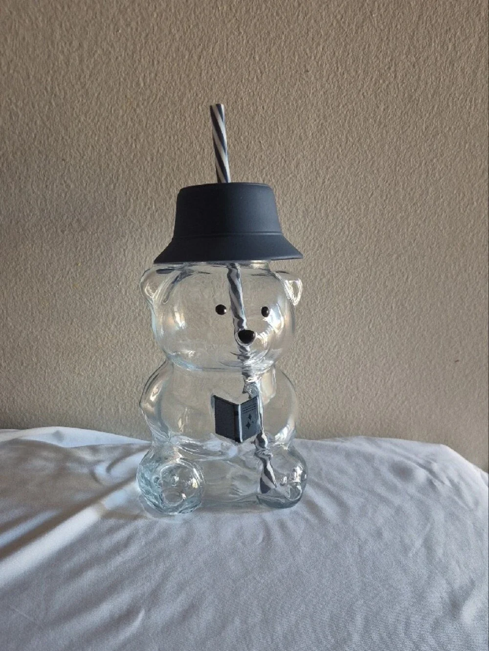 Clear Bear-Shaped Drinking Cup with Gray Lid and Striped Straw